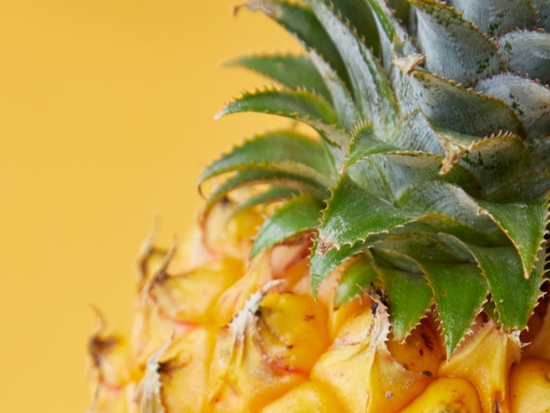 Fresh sweet pineapple with green leaves