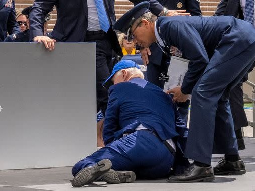 President Joe Biden falls