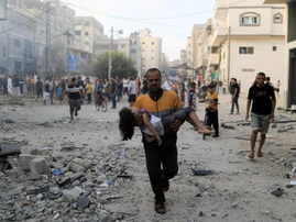 One week into war, thousands on the run in Gaza fearing Israel ground offensive