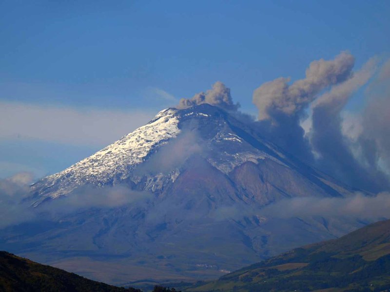 Ecuador volcano rumbles, spews ash cloud