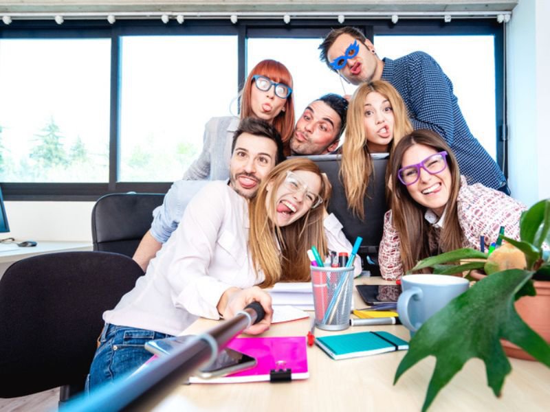 Gen Zs taking a selfie at work