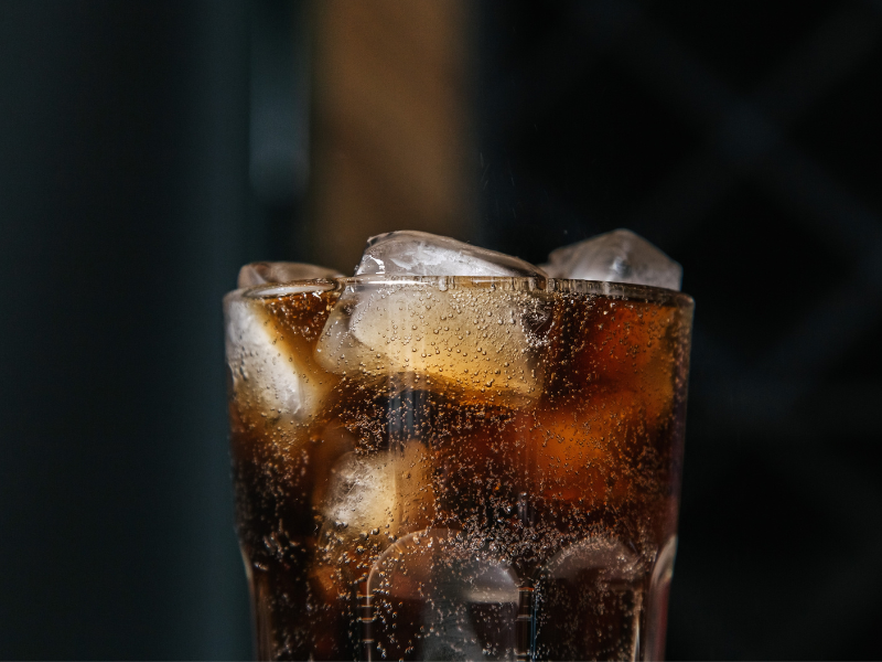 Glass of soda with ice cubes