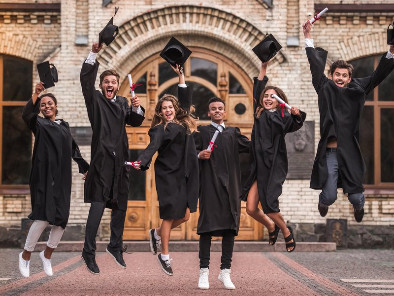 Happy young alumni