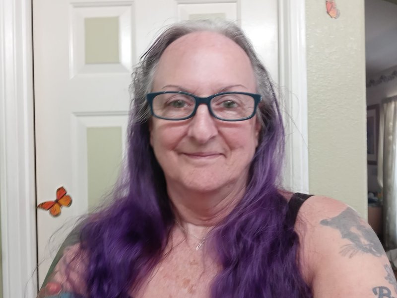 Grandmother covers her body in tattoos to help raise awareness for endangered animals