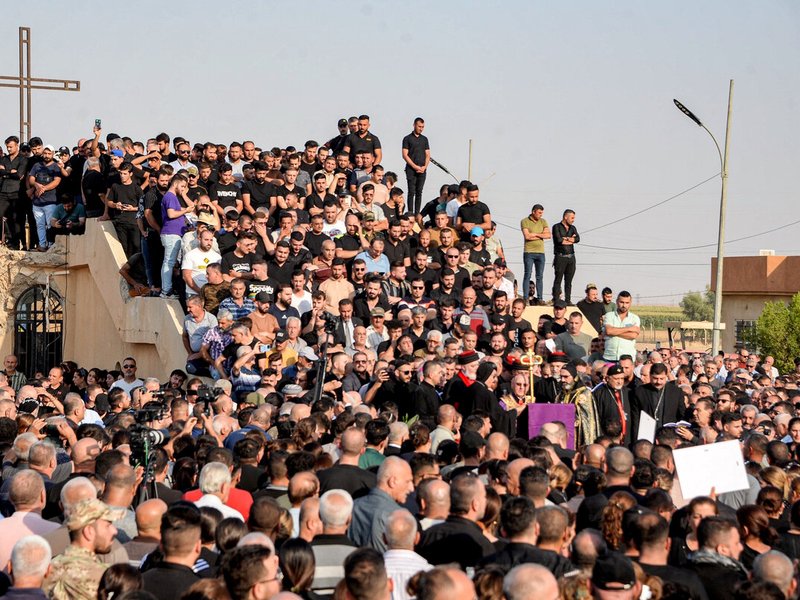Grief, anger at Iraq mass for victims of wedding fire