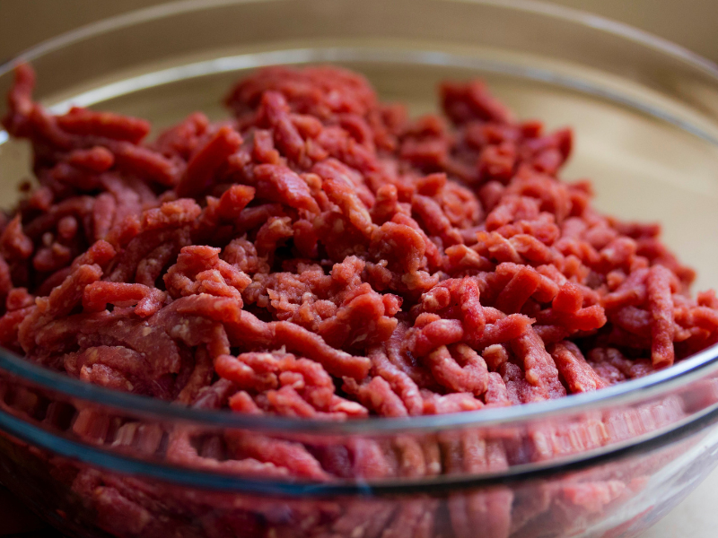 Ground meat in a glass bowl
