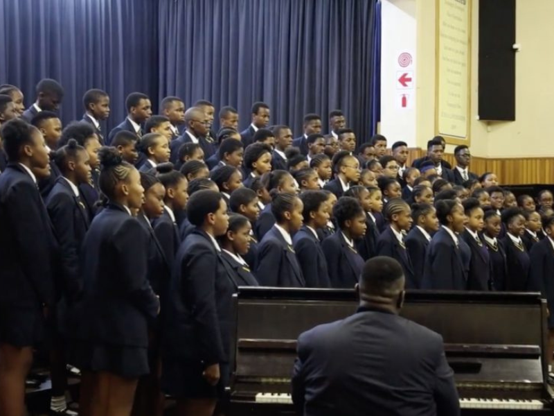 Group of students singing in a choir