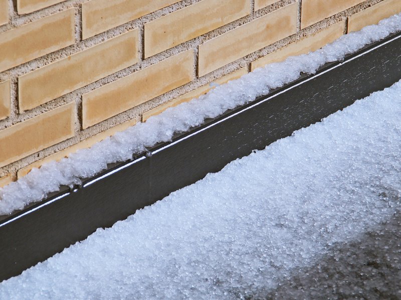 Hailstones on the floor of an attic terrace