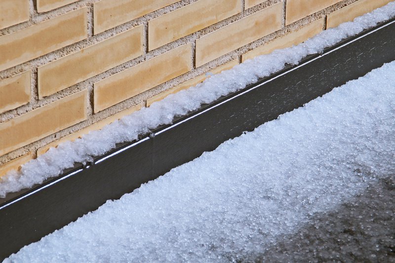 Hailstones on the floor of an attic terrace