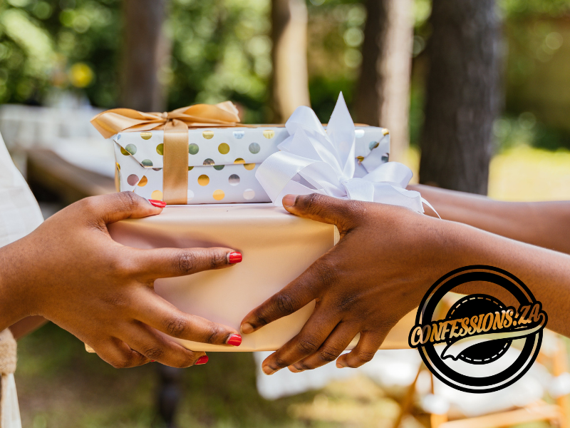 Hands giving and receiving wrapped presents