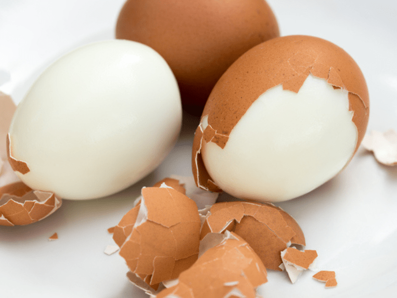 Hard boiled eggs on a white plate