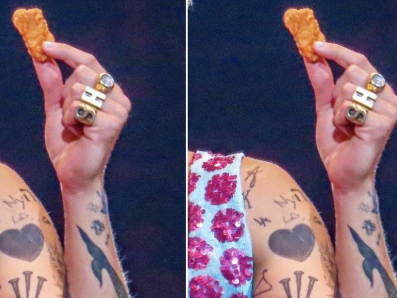 WATCH: Harry Styles has chicken nuggets violently thrown at him on stage