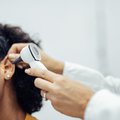 Hearing test being conducted on woman