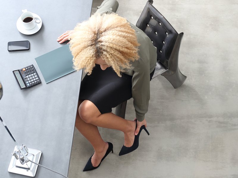 Woman in office wearing heels