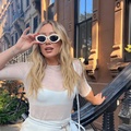 Hilary Duff wearing trendy sunglasses