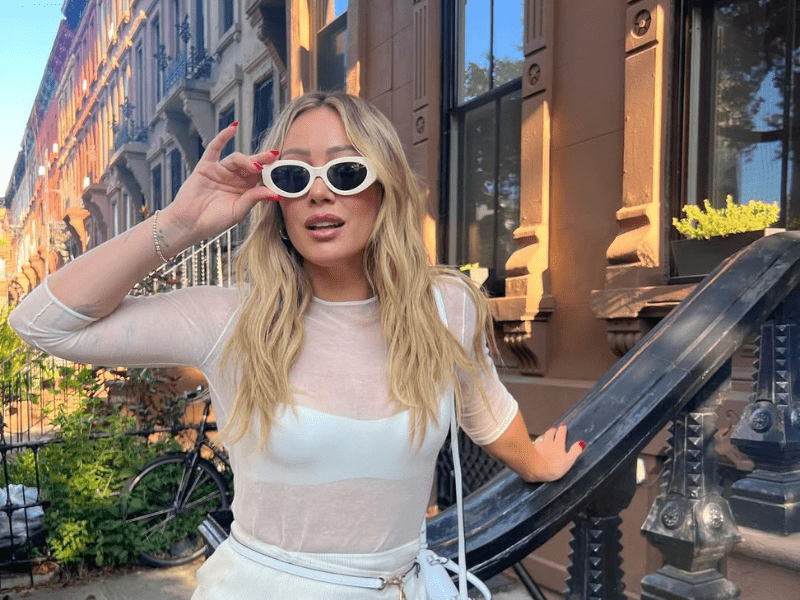 Hilary Duff wearing trendy sunglasses