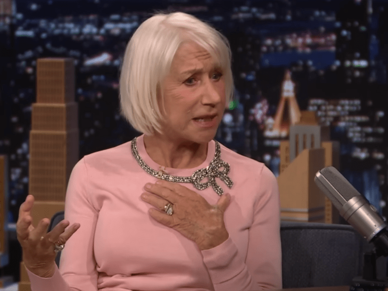 Dame Helen Mirren wearing a pink long sleeved dress