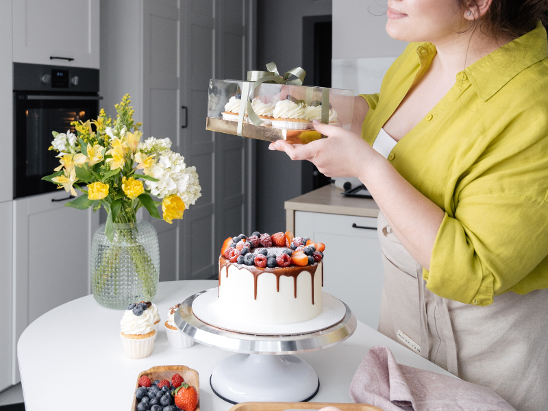 Home baker shows delicious cakes whilst filming video