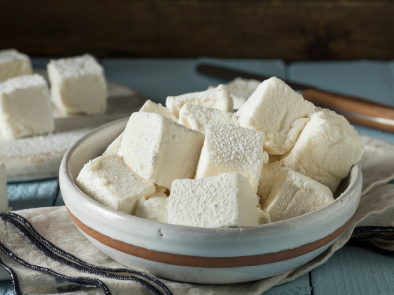 Homemade square marshmallows in a bowl