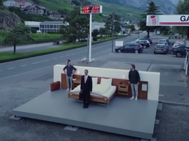 Hotel bed next to a petrol station in Switzerland