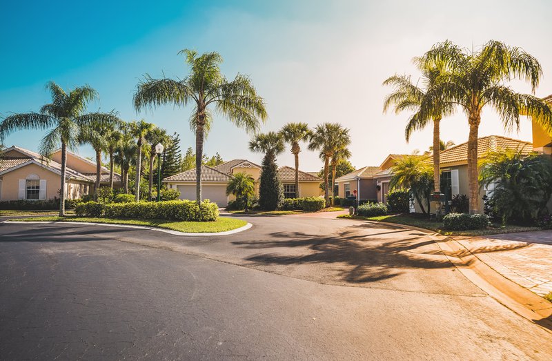 Gated community houses with palms