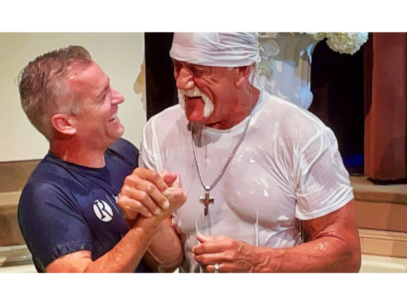 Hulk Hogan and his pastor embrace