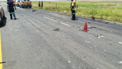One killed in collision between car, truck
