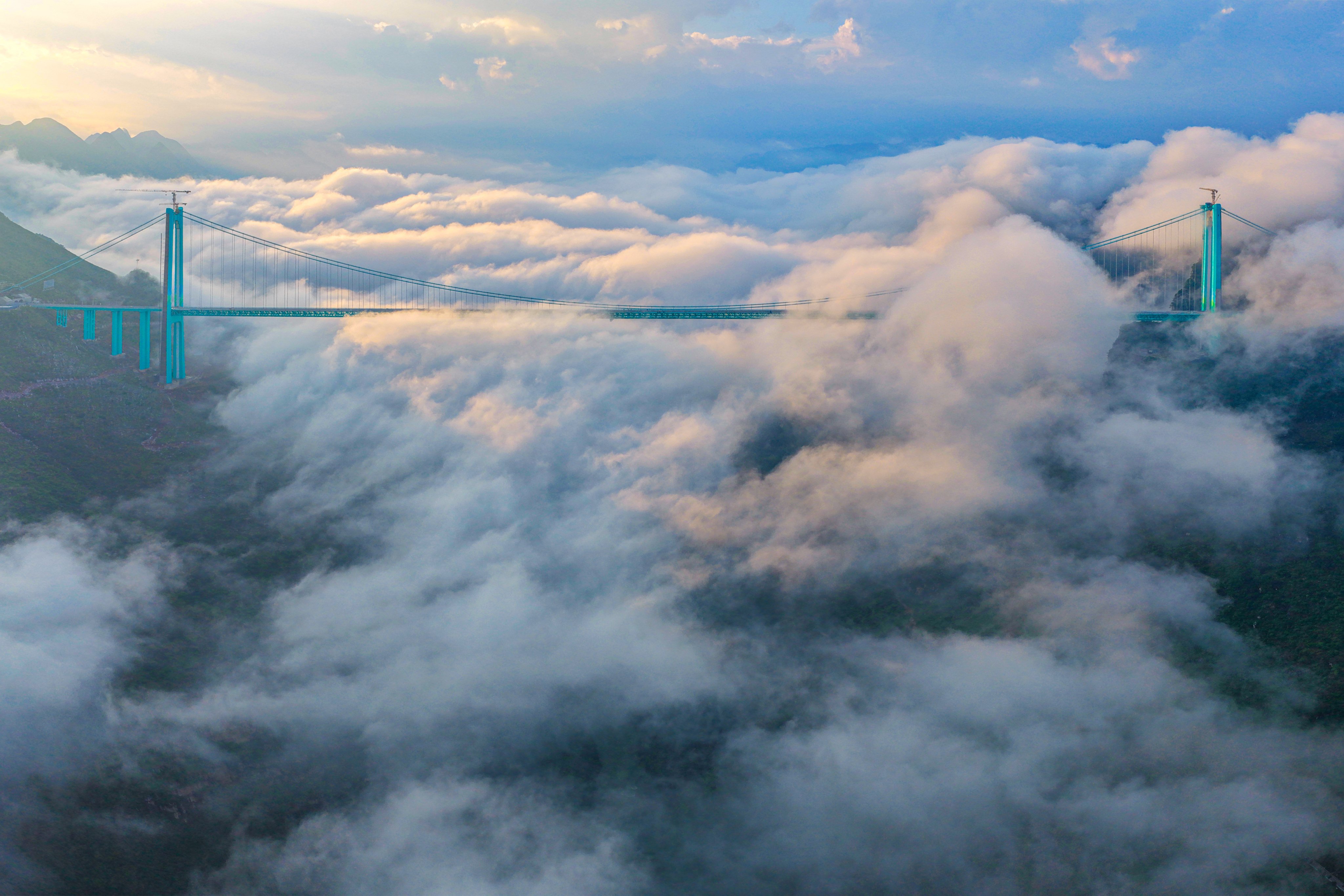 Huajiang Canyon Bridge clouds