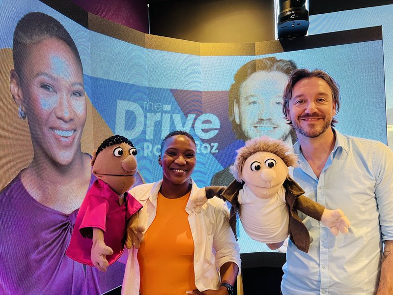 Rob Forbes and Rozanne McKenzie chat to Michelle Botha and her puppets