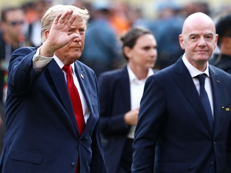 FIFA President Gianni Infantino (R) and US President Donald Trump arrive for the final ceremony after the 2026 World Cup football tournament final match between Spain and Argentina at the New York/New Jersey Stadium in East Rutherford on July 19, 2026
