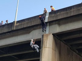 IPSS Rescue going down a rope on Connaught Bridge