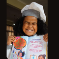 Imari-Kenya James wearing a chef's hat