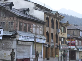 Indian paramilitary personnel patrol Pahalgam