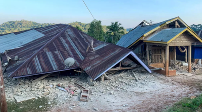 Indonesia earthquake kills at least 20 and sparks mass evacuations