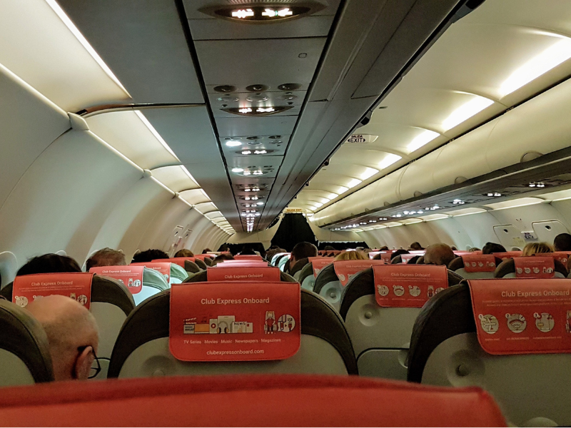 Interior of airplane with passengers