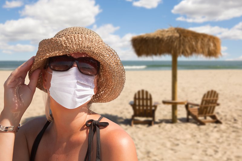 Vacationing Woman Wearing Face Mask