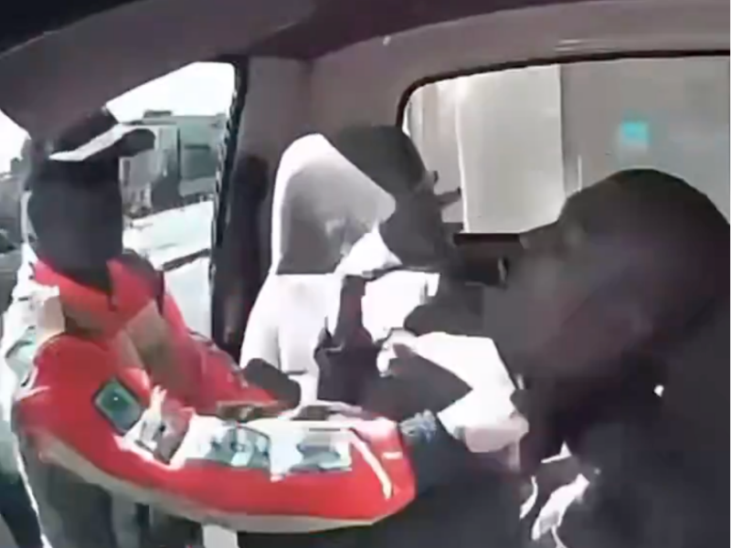 JMPD OFFICER GRABS MAN BY NECK