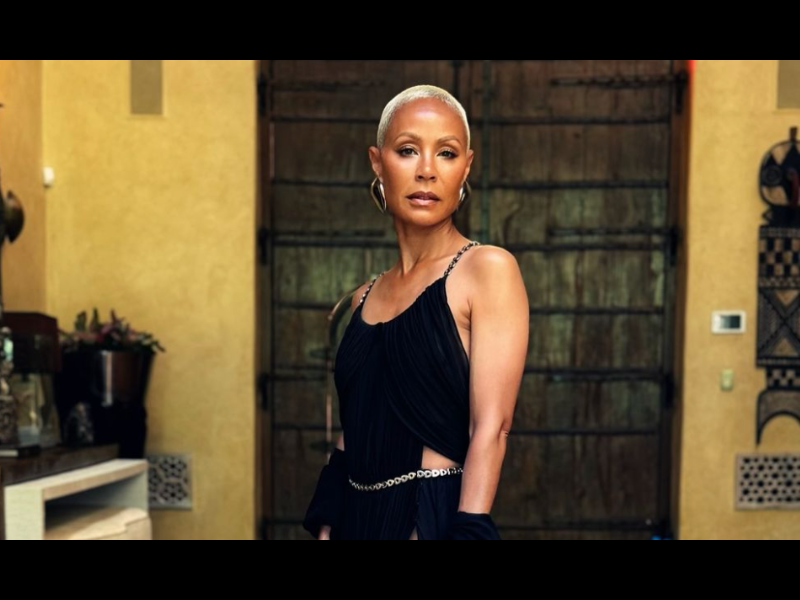 Jada Pinkett Smith wearing a black cut out dress.png