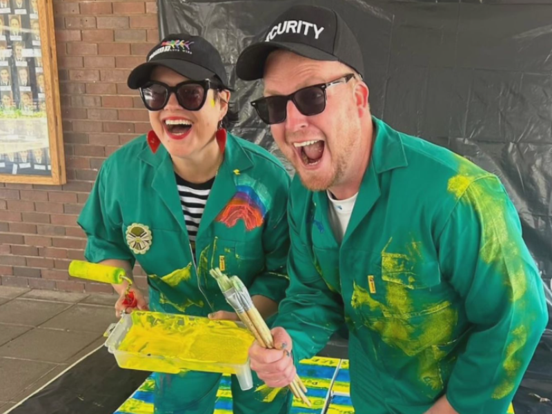 Jane Linley-Thomas wearing green overalls in art installation for Mental Health with Jonathan Mazoue