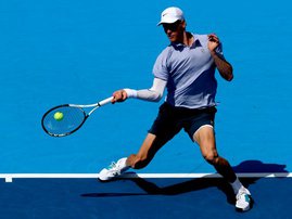 Jannik Sinner of Italy returns a shot to to Daniel Elahi Galan of Colombia during the Cincinnati Open