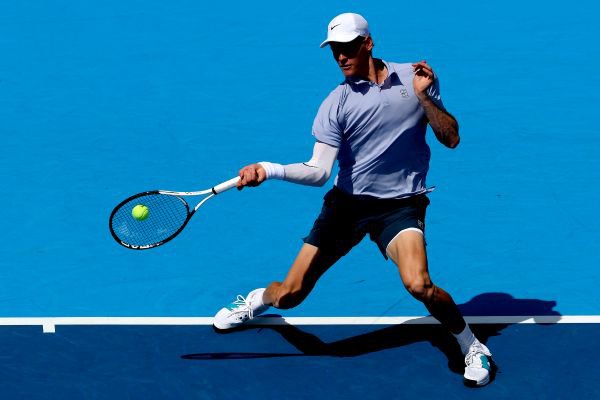 Jannik Sinner of Italy returns a shot to to Daniel Elahi Galan of Colombia during the Cincinnati Open