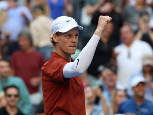 Jannik Sinner celebrates defeating Denis Shapovalov in their men's singles third round match on day seven of the US Open