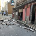Major earthquake collapsed buildings and sparked fires in Japan's southwest