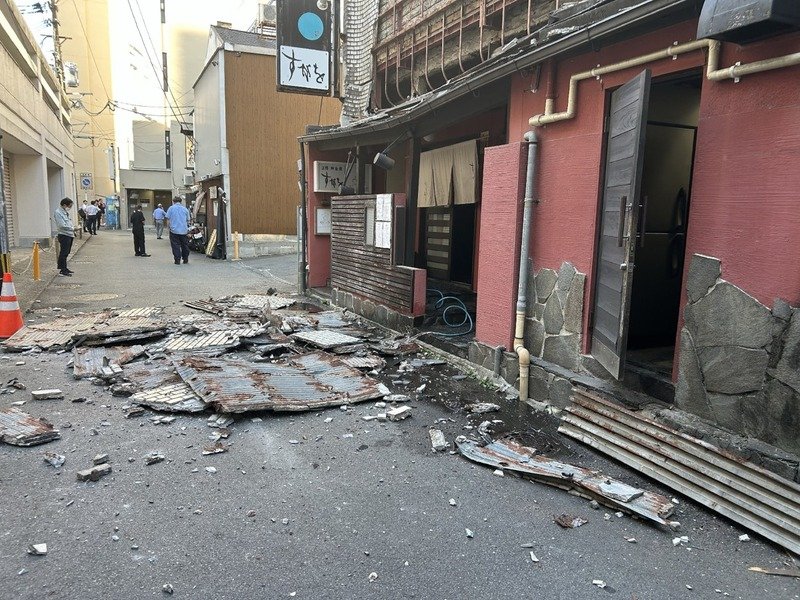 Major earthquake collapsed buildings and sparked fires in Japan's southwest