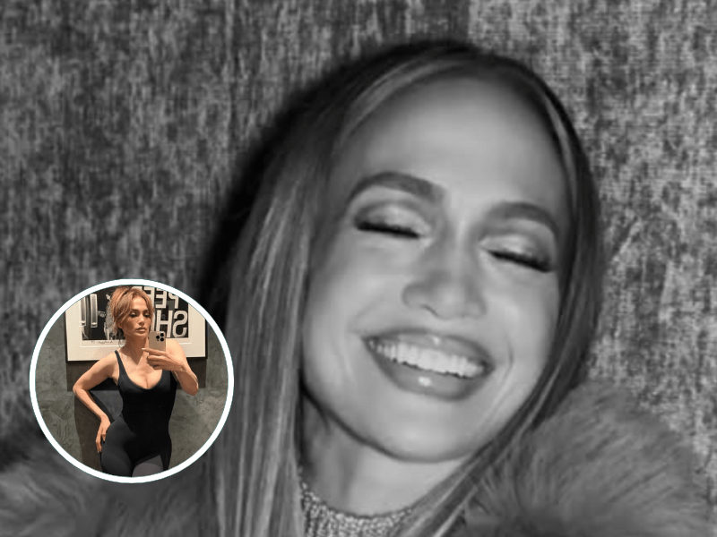Black and white picture of Jennifer Lopez smiling joyfully