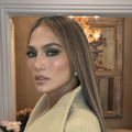 Jennifer Lopez wears a beige coloured coat