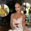 Jennifer Lopez sitting at restaurant table