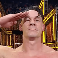 John Cena raises his hand in a salute