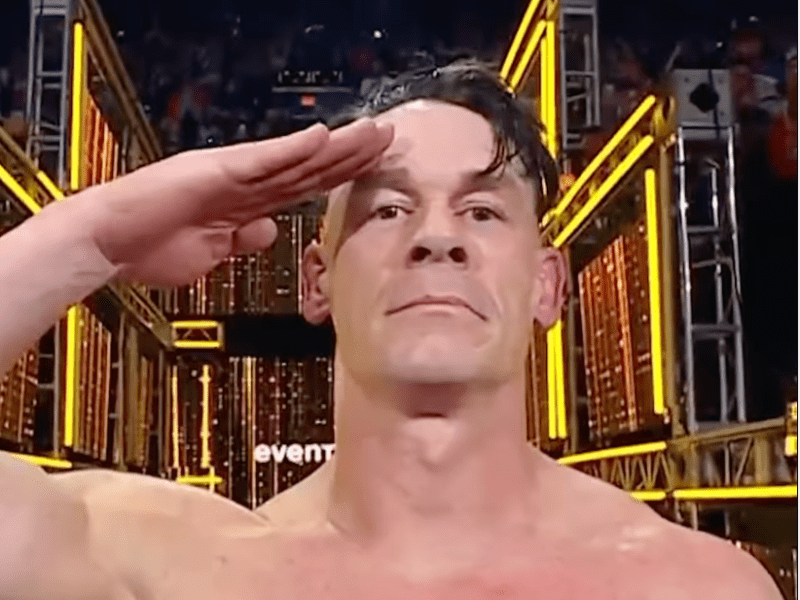 John Cena raises his hand in a salute