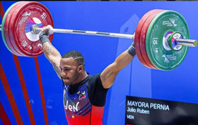 Olympic weightlifter hoists debris for Venezuela earthquake recovery